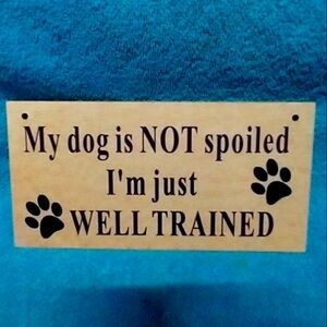 Well Trained Dog Sign - Black Text on Tan Funny Humorous Wood